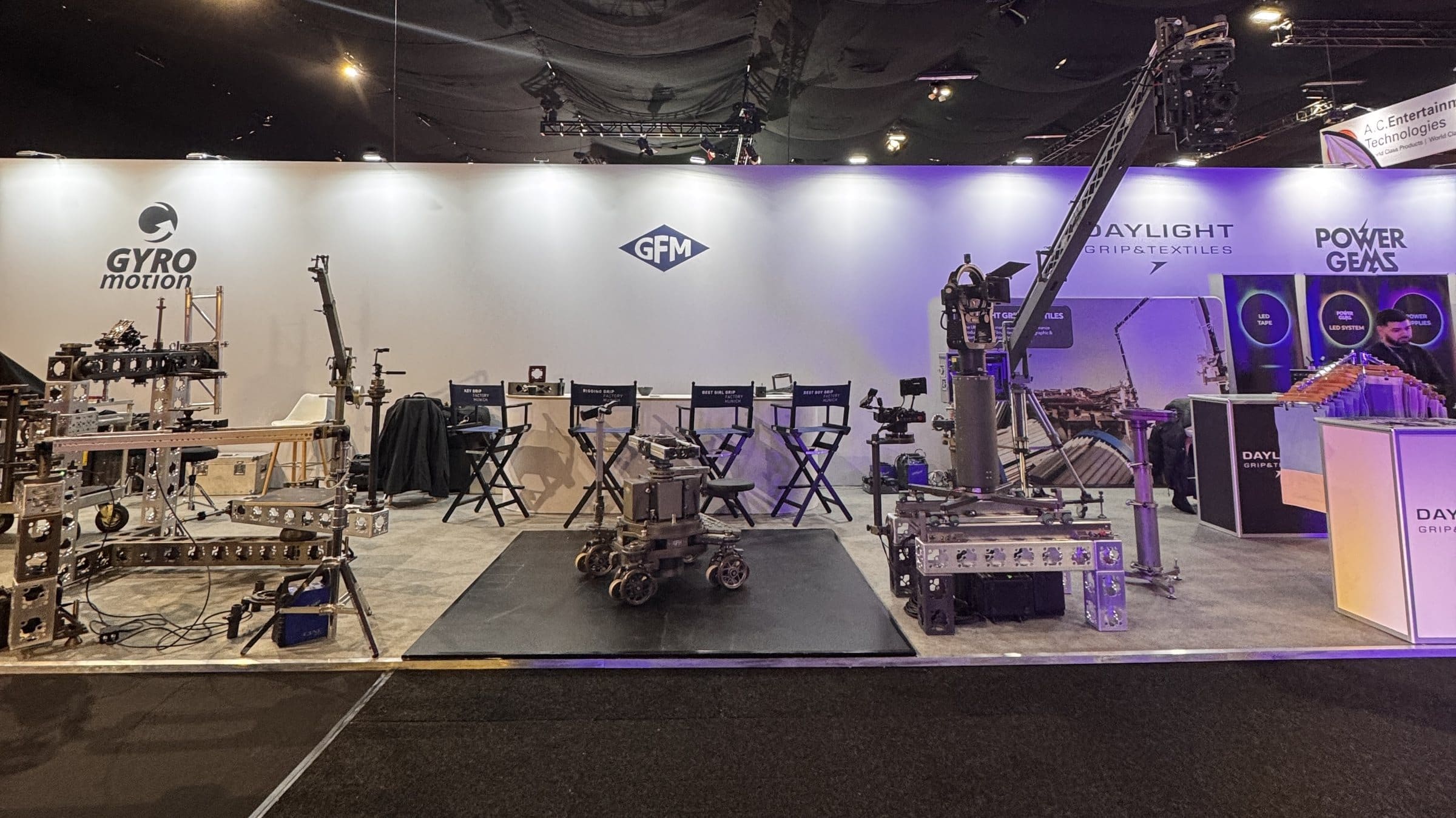The shared GFM stand at BSC Expo 2026, with Gyro Motion, GFM, Daylight Grip & Textiles and Power Gems on one wall and grip equipment set out on the floor